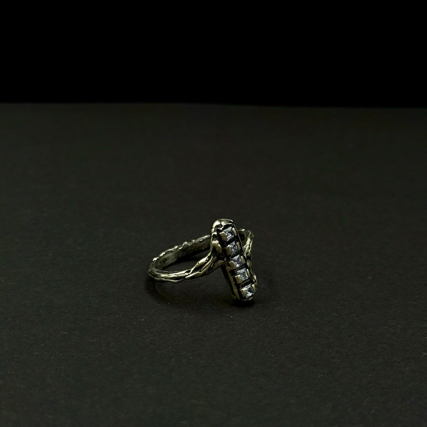 Handmade silver ring with a row of sparkling cubic zirconia