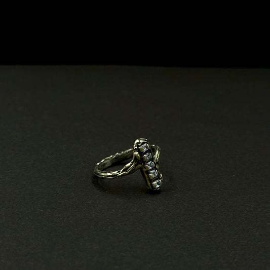 Handmade silver ring with a row of sparkling cubic zirconia