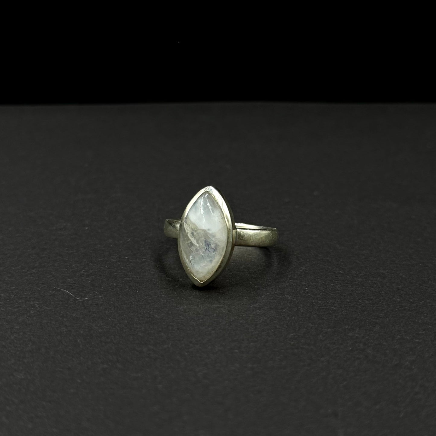 Sterling silver ring with a marquise-cut natural moonstone