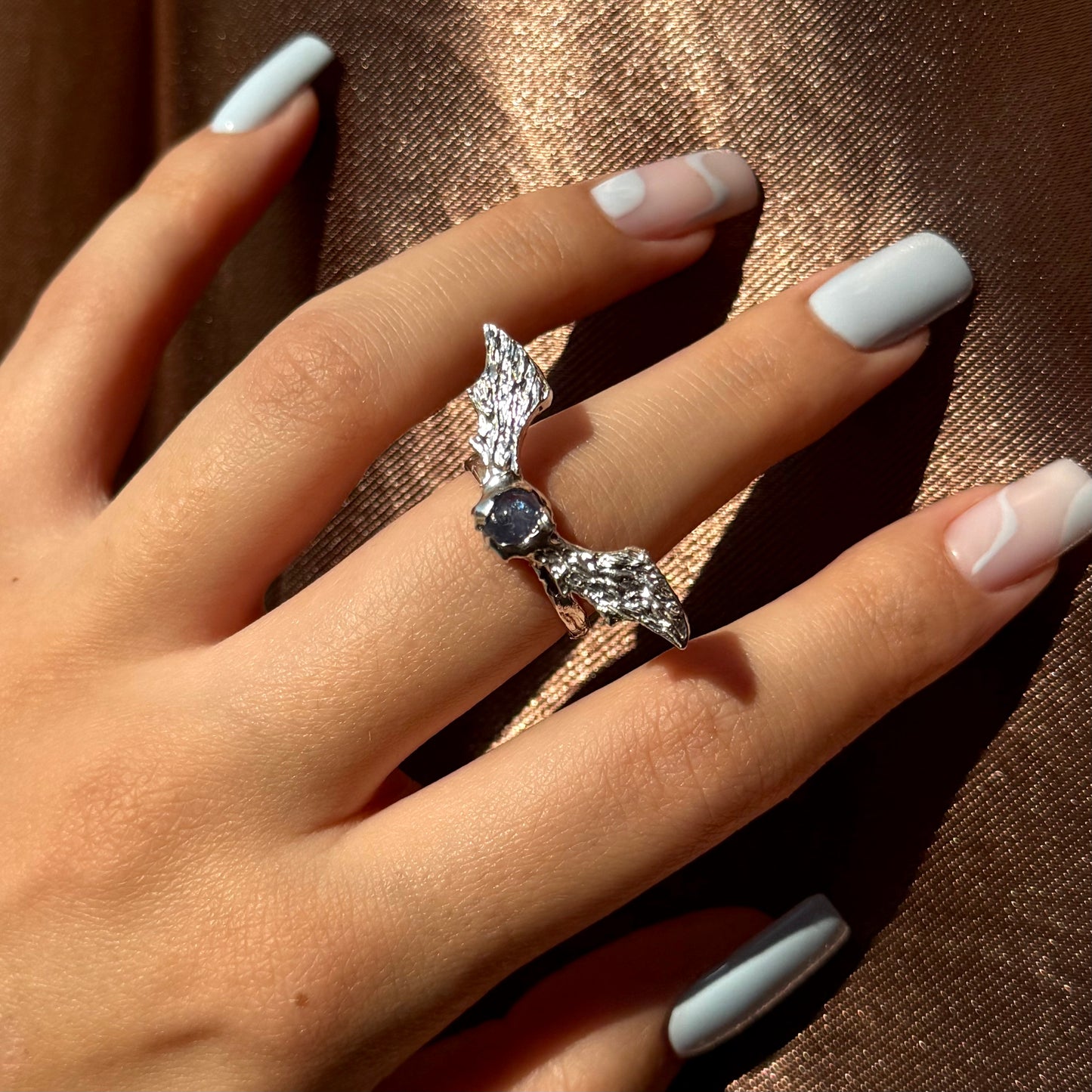 Handmade silver wing rings with natural gemstones