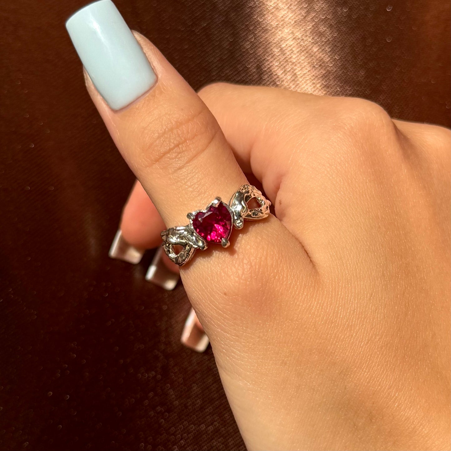 Handmade silver ring with heart-shaped cubic zirconia