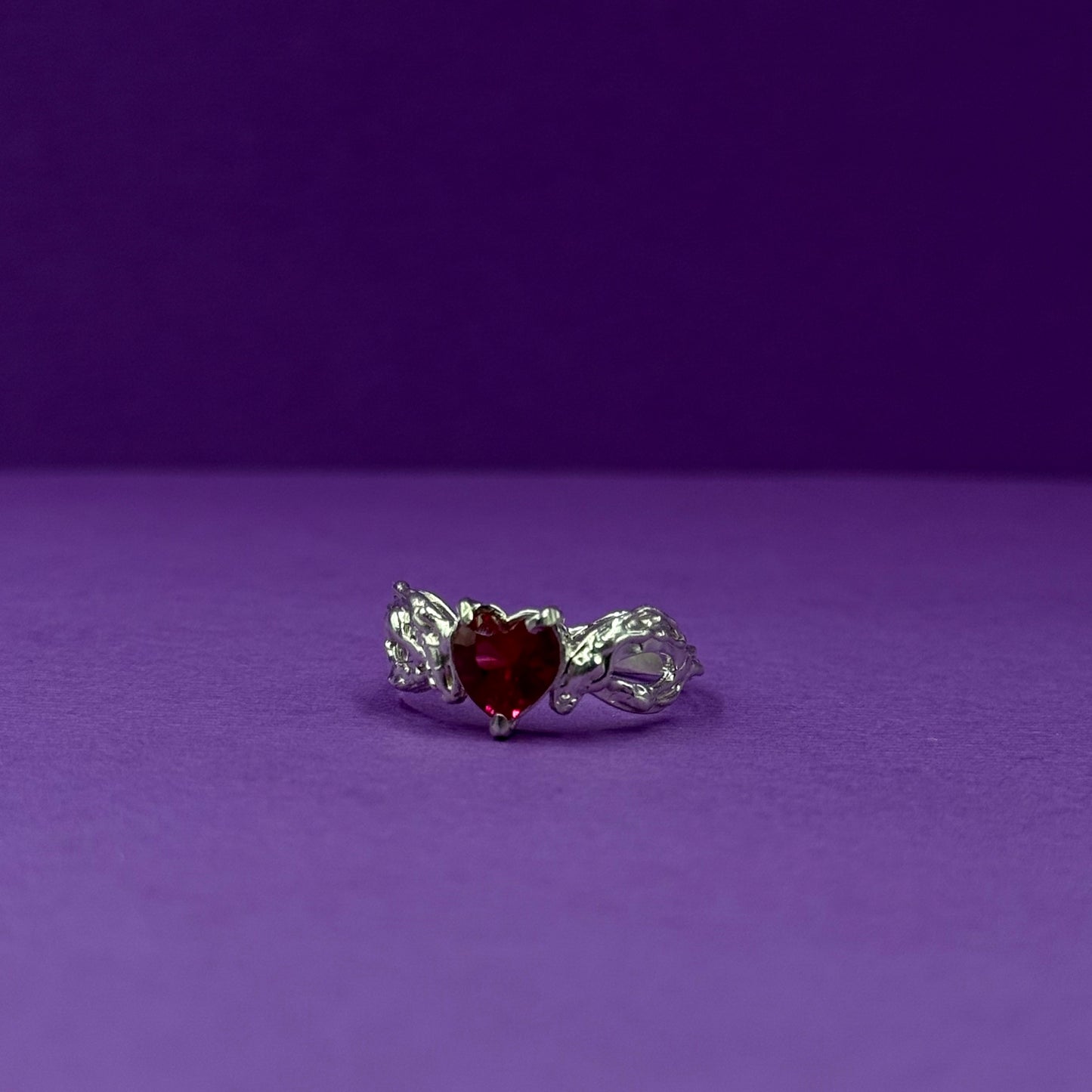 Handmade silver ring with heart-shaped cubic zirconia