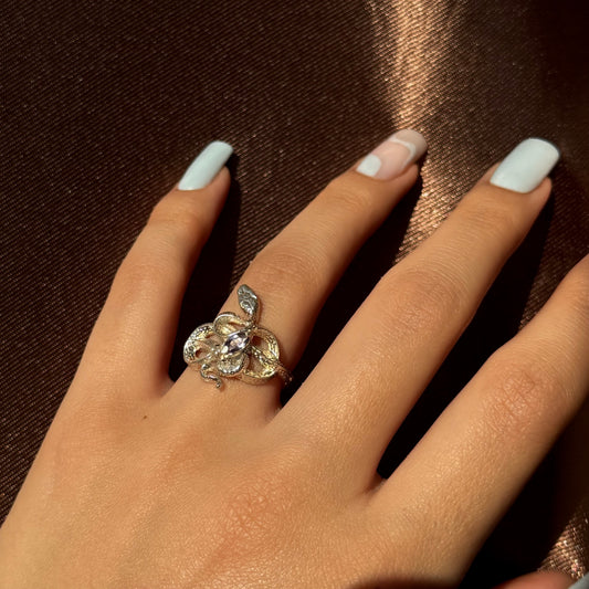 Handmade silver snake ring with intricate detail. Choose amethyst, sapphire, or emerald — each stone carries its own meaning. Crafted with care to last a lifetime