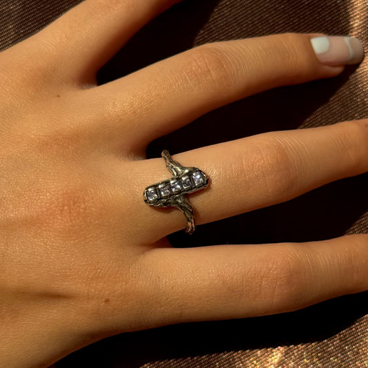Handmade silver ring with a row of sparkling cubic zirconia