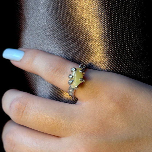 Handmade silver ring with a natural opal gemstone