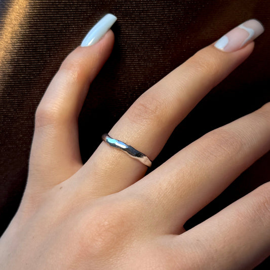 Minimalist sterling silver ring with a wavy texture