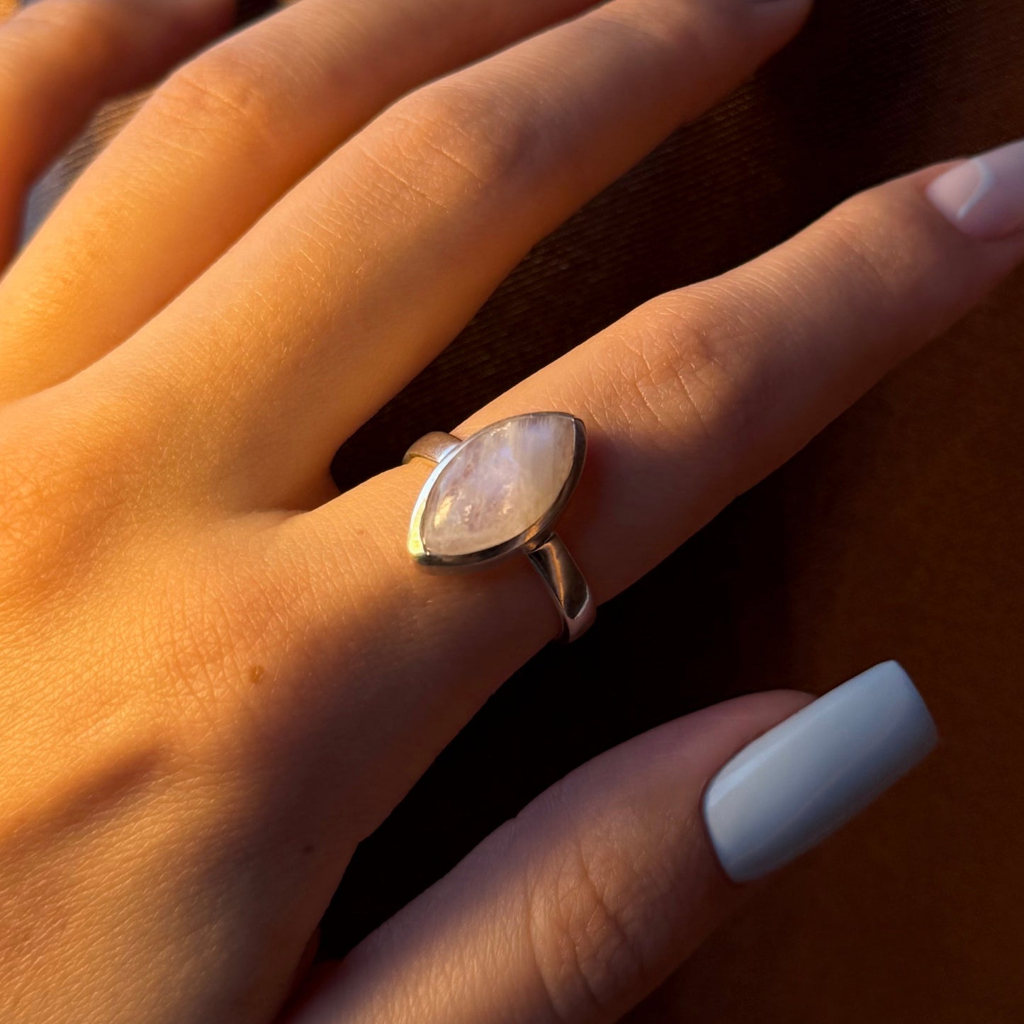 Sterling silver ring with a marquise-cut natural moonstone