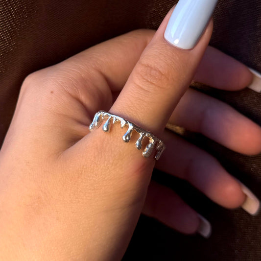 Handmade silver band with unique molten drip design