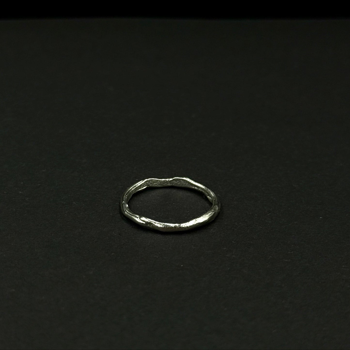 Minimalist sterling silver ring with a wavy texture