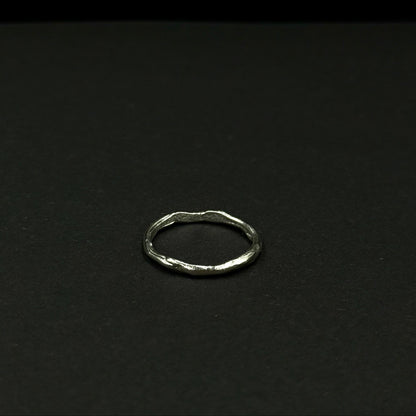 Minimalist sterling silver ring with a wavy texture