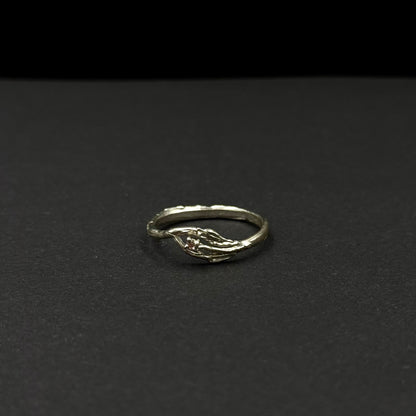 Handmade silver ring with a delicate leaf-inspired design