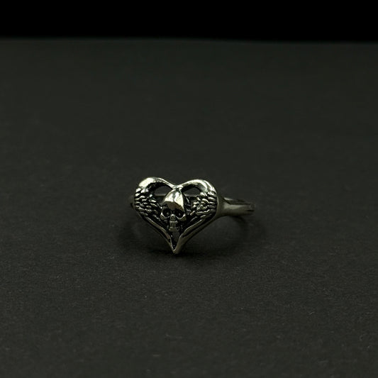 Handmade silver ring with heart-and-skull design
