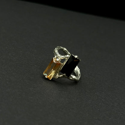 Handmade silver ring with two baguette-cut cubic zirconia stones (different colors)