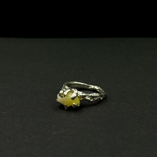 Handmade silver ring with a natural opal gemstone