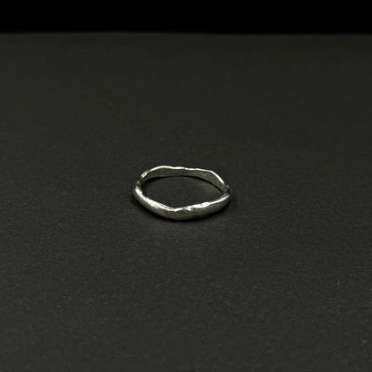 Minimalist sterling silver ring with a wavy texture