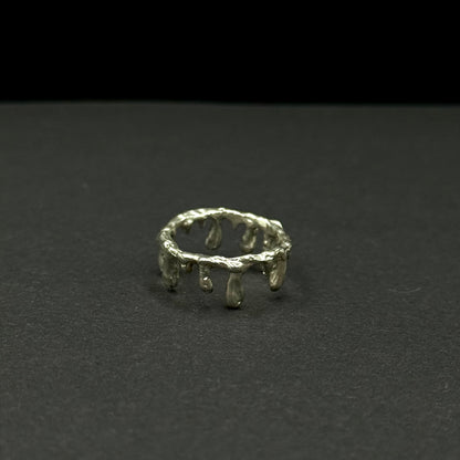 Handmade silver band with unique molten drip design