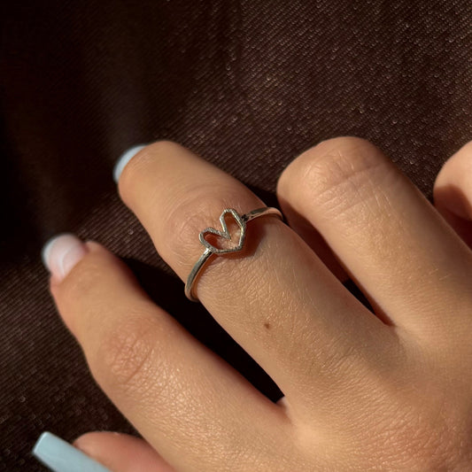 Adjustable silver ring with a heart design