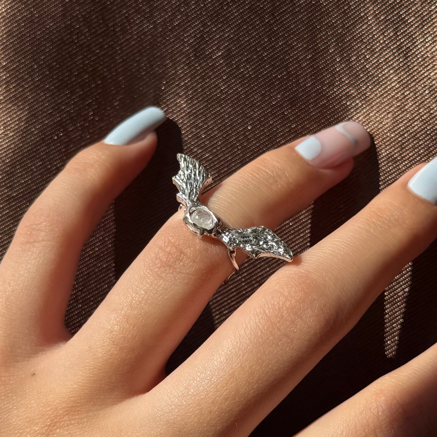 Handmade silver wing rings with natural gemstones