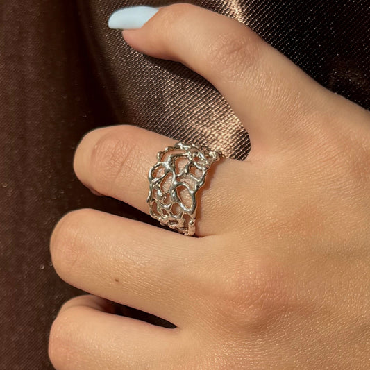 Handmade silver ring with organic openwork design