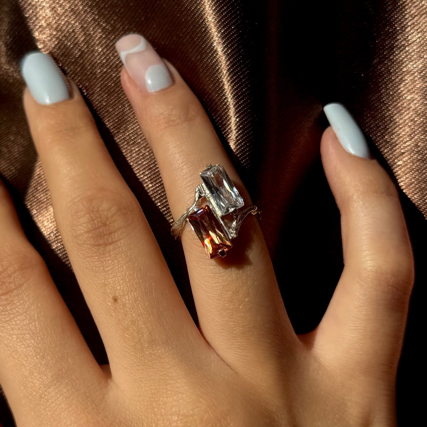 Handmade silver ring with two baguette-cut cubic zirconia stones (different colors)