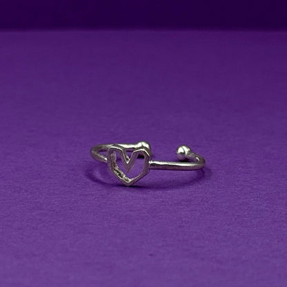 Adjustable silver ring with a heart design