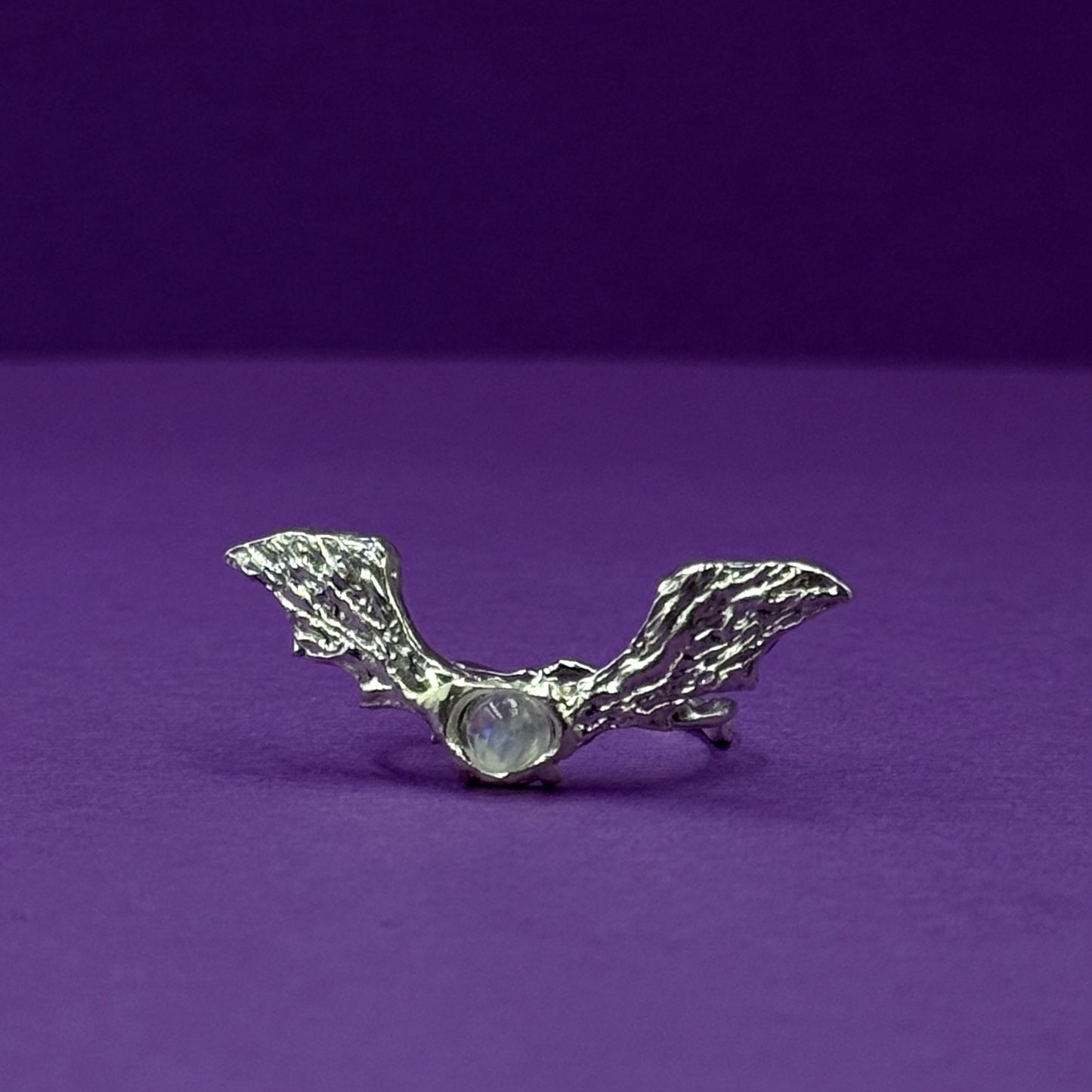 Handmade silver wing rings with natural gemstones
