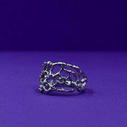 Handmade silver ring with organic openwork design