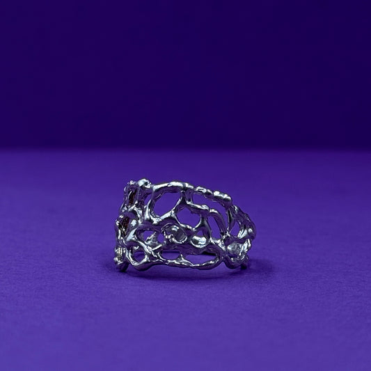 Handmade silver ring with organic openwork design