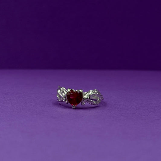 Handmade silver ring with heart-shaped cubic zirconia
